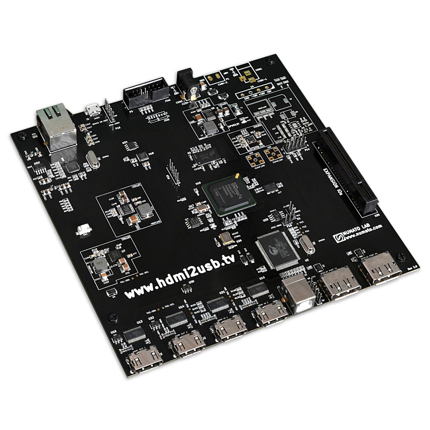 Numato Opsis: a black circuit board with HDMI, DisplayPort and Ethernet ports and a Spartan-6 FPGA
